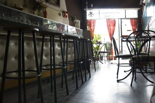 Low angle shot of a closed coffee shop, in perspective