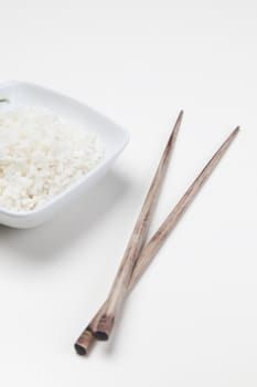 Bowl of white rice isolated on white