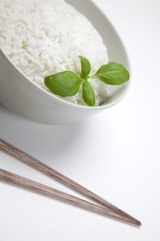 Bowl of white rice isolated on white