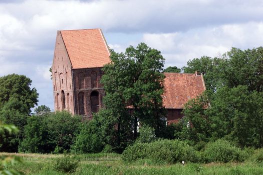 The inclined tower of Suurhusen is a church tower in the east-frisan place Suurhusen, municipality Hinte, to which as inclined tower of the world is considered. With a height of 27.37 meters the tower at the roof has an overhang of 2.43 meters, which corresponds to an inclination of 5.07 degrees.