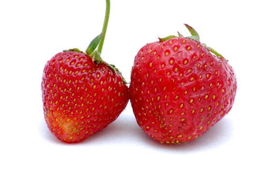 two strawberries isolated on the white background