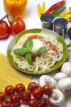 Pasta with tomato sauce basil and grated parmesan