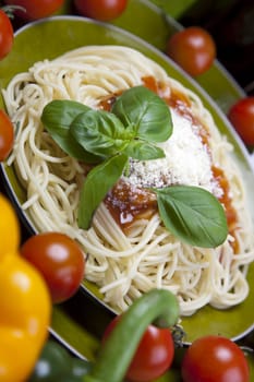 Pasta with tomato sauce basil and grated parmesan