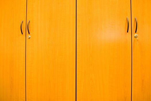 Detail of wooden closets in an office.