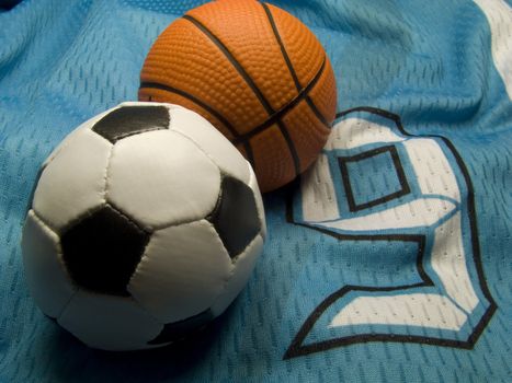 soccer and basketball bals on the number nine uniform