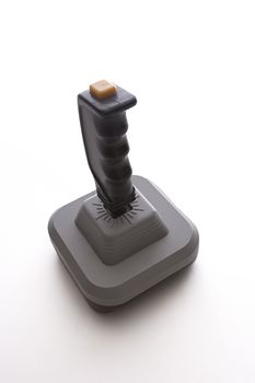 old school joystick with yellow trigger button