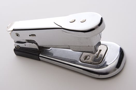 close up of a dirty old metal stapler