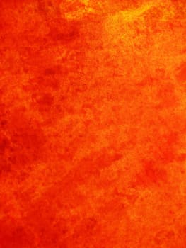 Orange grunge background with lots of texture and scratches. Great for Halloween and other uses.