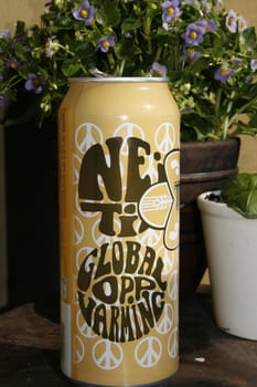A political correct can of beer. Text: Nei til global oppvarming. Marketing gimmick.