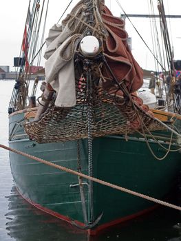 Prow of a traditional vintage classical wood sailboat tall-ship