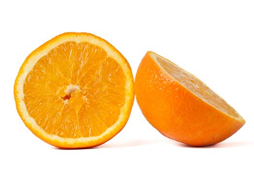 An orange sliced in half isolated on white background