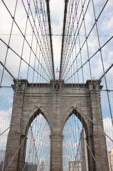 Steel cables and archway spanning the East River