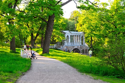 Old antique bridge in green environment , Pushkin, Russia