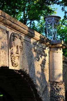 Old antique bridge in green environment , Pushkin, Russia