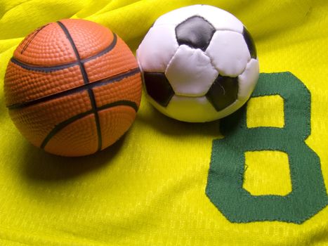 soccer and basketball balls on the uniform