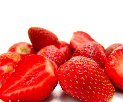 Ripe red strawberry on a white background                       