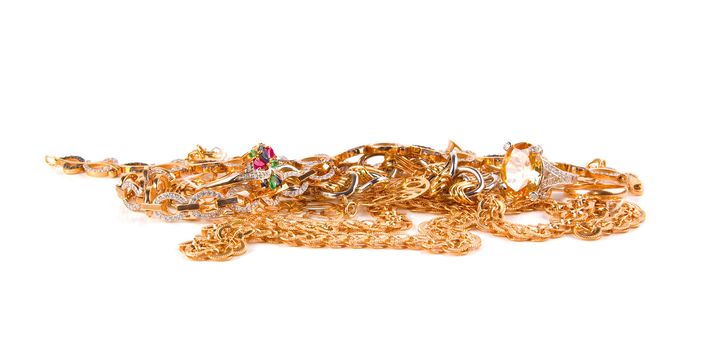 Pile of Gold Jewelry on a white background