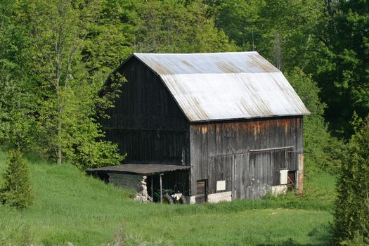 Barn in green valley