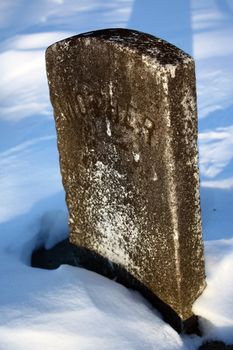 an old headstone in an ancient graveyard that reads "mother"