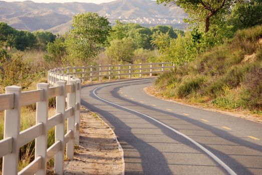 A bike path winds through the hills.