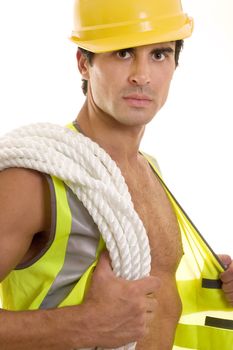Builder wearing work vest.