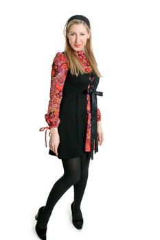 Beautiful woman wearing a hippie style mini dress.