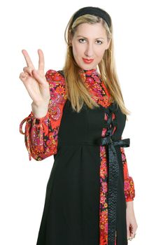 Woman makes a gesture of peace.