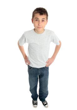 A pre teen child standing with hands on hips
