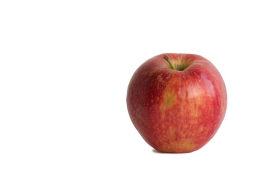 The beautiful red apple is isolated on a white background.