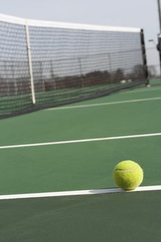 a picture of a tennis ball on the court