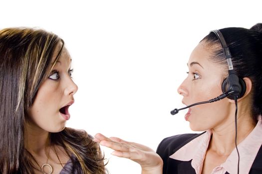 Two business women surprised at a call