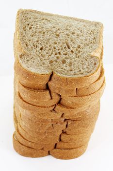 a close up macro of stacked wheat bread