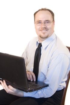 Young business man with laptop on white background