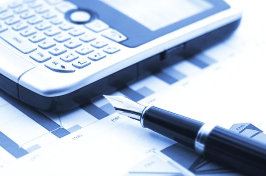 financial stock market success concept with chart and pen