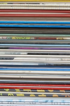 a lot of books stacked on a table