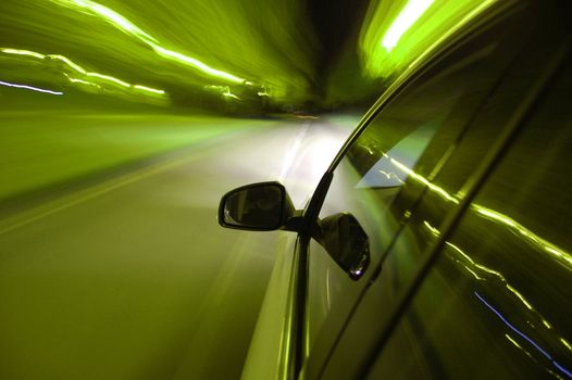night drive with car in motion through the city shows the speed