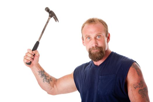 Face of a trong man with hammer in hand, isolated.
