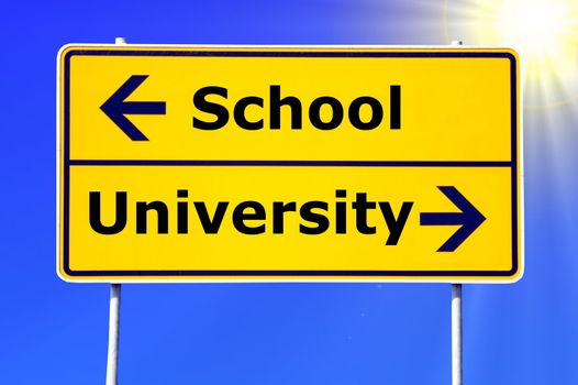 school and university education concept with yellow road sign