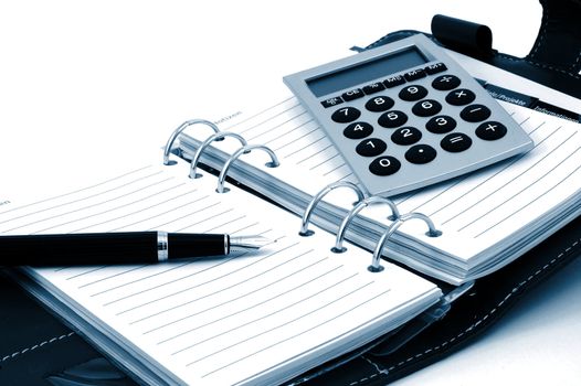business organizer, notebook or planner with pen
