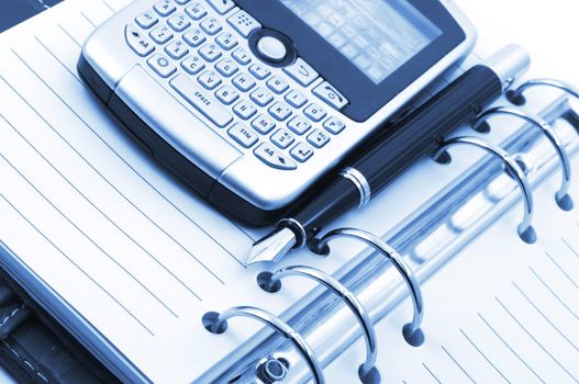notebook and smart phone showing business concept