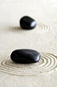zen garden with sand stones and copyspace for a text message