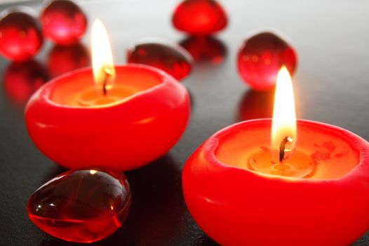 spa decoration with candles on black background