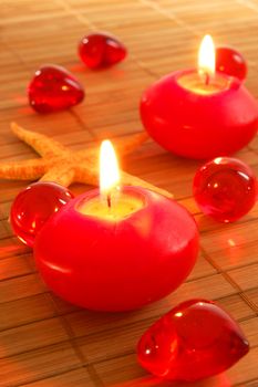 romantic red candles showing spa or love concept