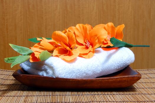 spa and wellness concept with flowers zen stones and towel
