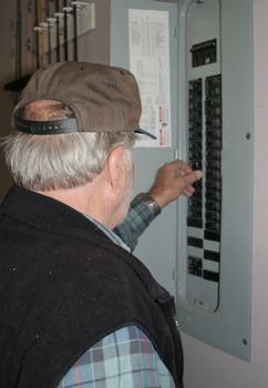 Man working on electrical box