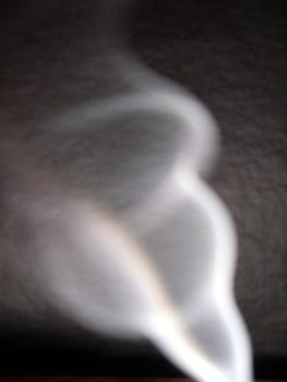 A swirl of smoke creating an abstract pattern