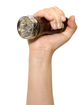 Hand with small torch isolated on white background