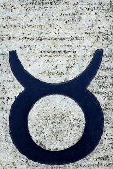 The sign of the zodiac - Taurus - set in stone.