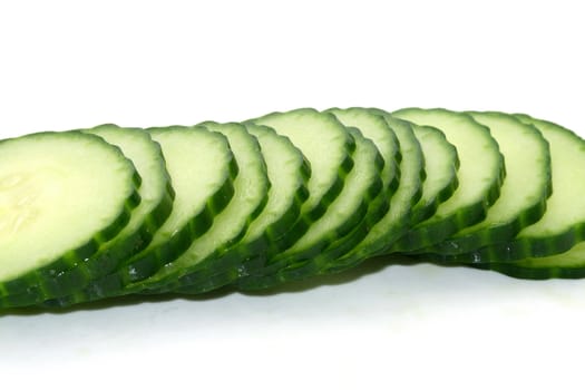 a row of cut cucumber slices