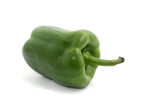 a green paprika on white background